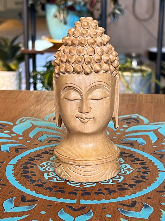 Wooden carved Buddha head