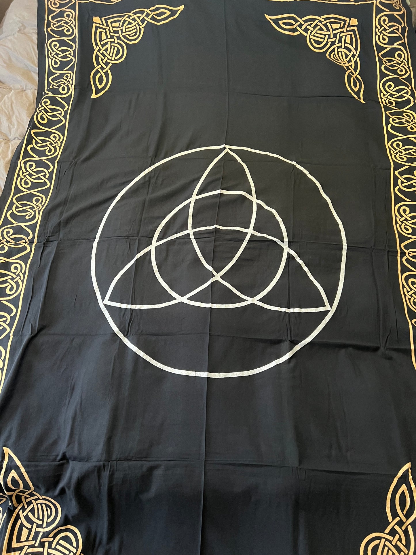 Triquetra black and gold tapestry