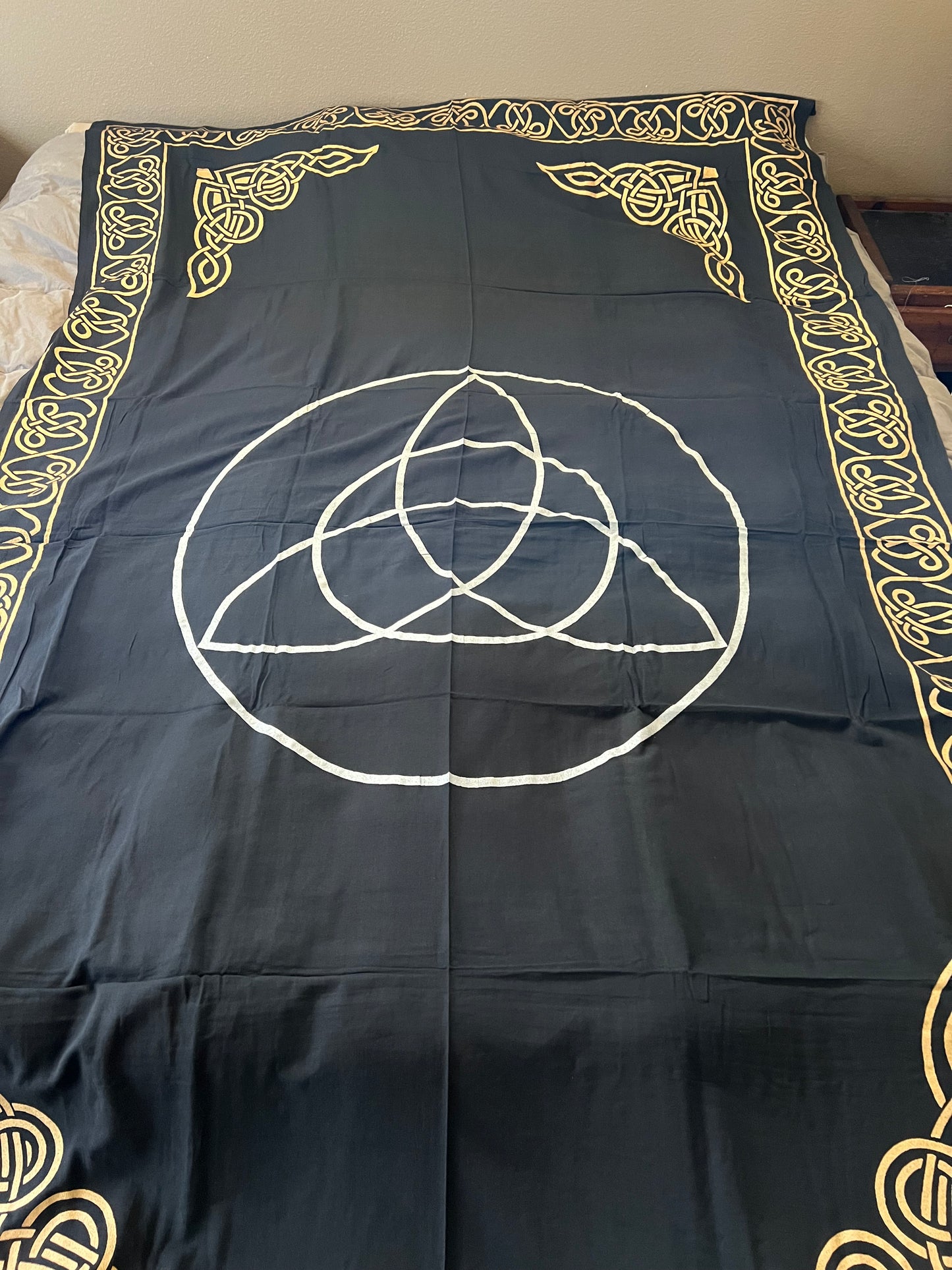 Triquetra black and gold tapestry