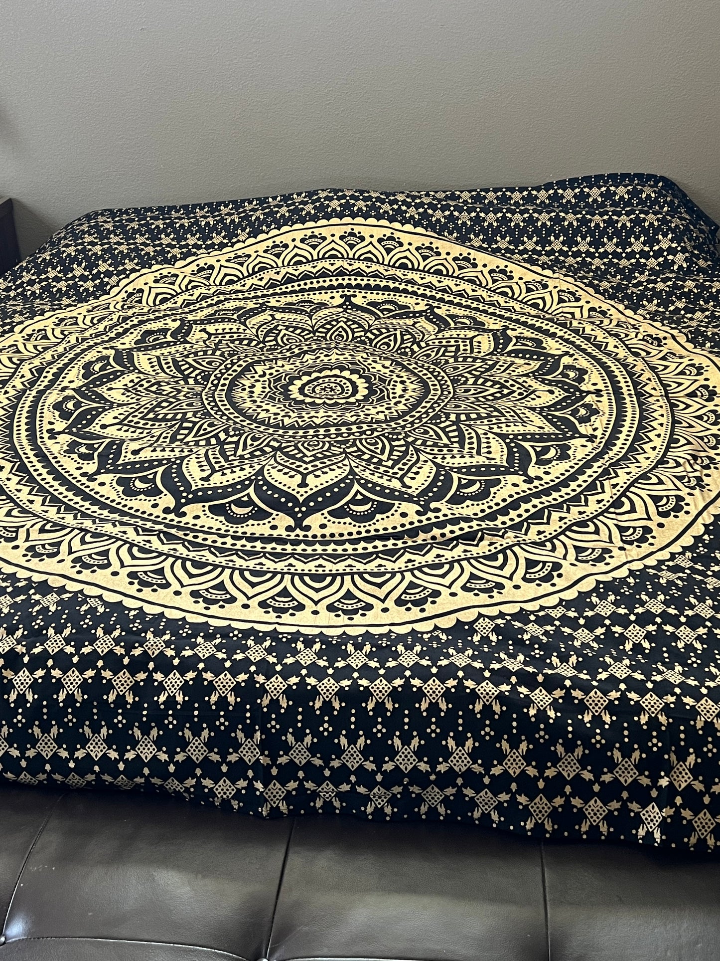 Black and gold tapestry