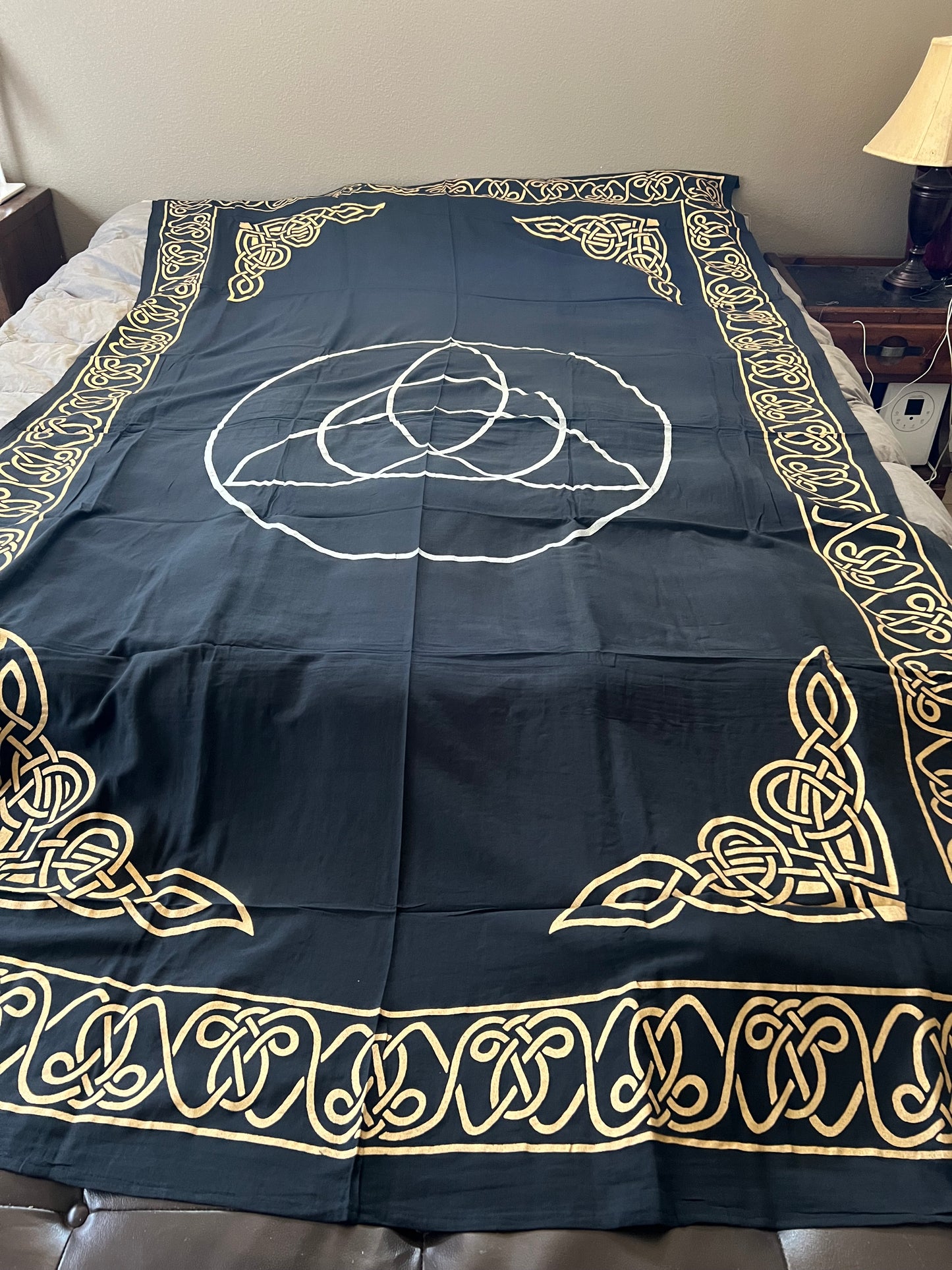 Triquetra black and gold tapestry