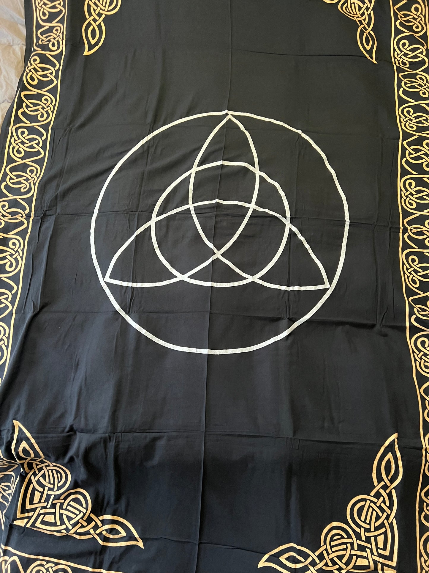 Triquetra black and gold tapestry